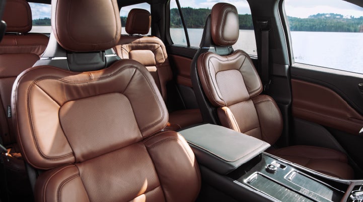 The front row's Perfect Position Seats in a 2024 Lincoln Aviator® Reserve model with Ebony Roast interior | Johnson Sewell Lincoln in Marble Falls TX