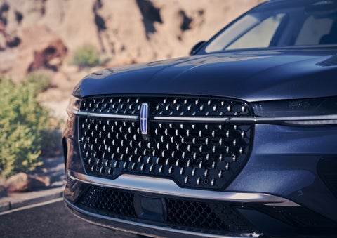 The stylish grille of a 2024 Lincoln Nautilus® SUV sparkles in the sunlight. | Johnson Sewell Lincoln in Marble Falls TX